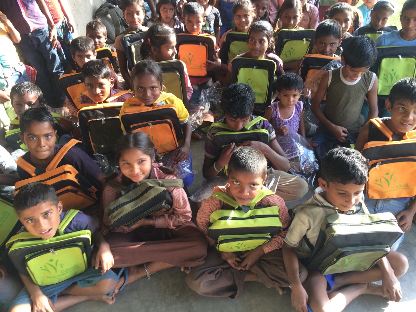 Children of the community receiving learning kits